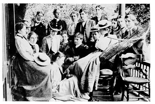 old black and white photograph of students on  porch