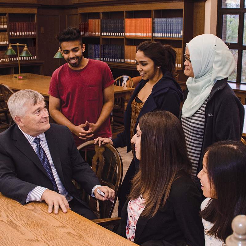 Eric Barron with students at the library