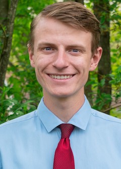 Clay Kimsal headshot, a senior in engineering at Penn State Hazleton, against a background of green trees