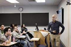 Professor Justin Nordstrom, Penn State Hazleton, teaching class in a small classroom
