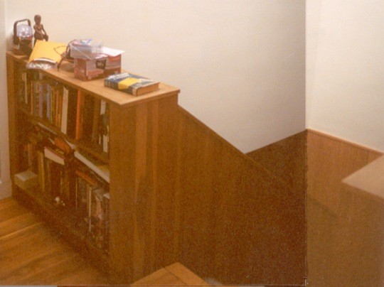 Bookcase by stairs