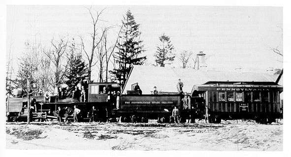 old black and white photograph of railroad locomotive and dynamometer car