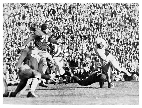 old black and white photograph of footbal game action