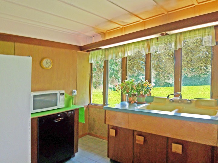 View of kitchen cabinets and built-in storage